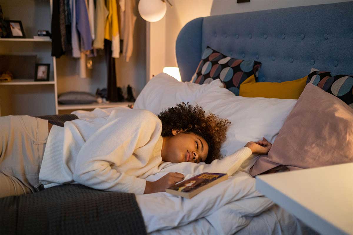 Free self-care idea — a college student taking a real 25-minute nap to recover from burnout