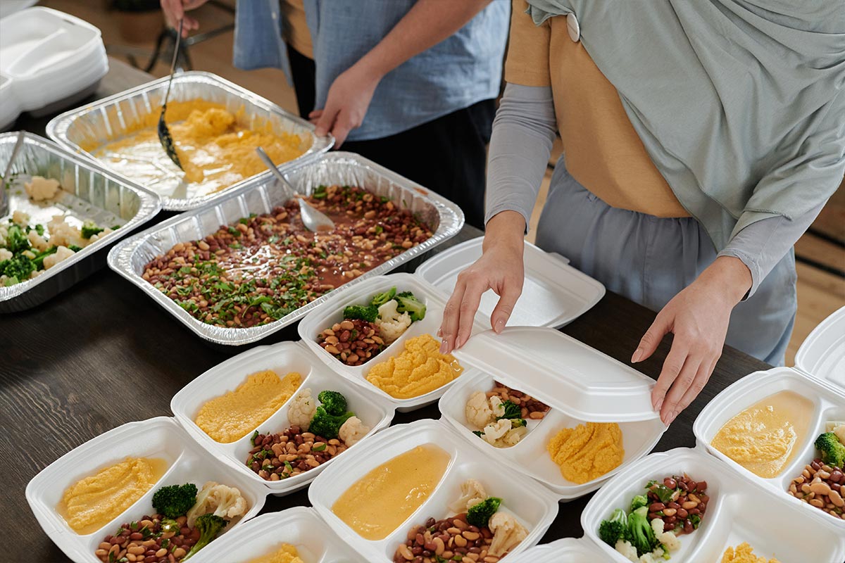 Budget meal prep portioned into containers with vegetables and beans — cheap meal prep ideas for the week