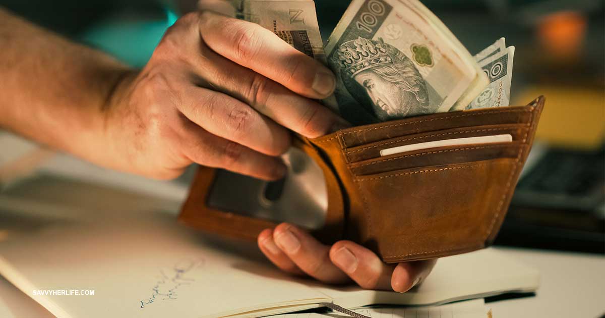 Budgeting for beginners — hands counting cash next to documents and a pen on a desk